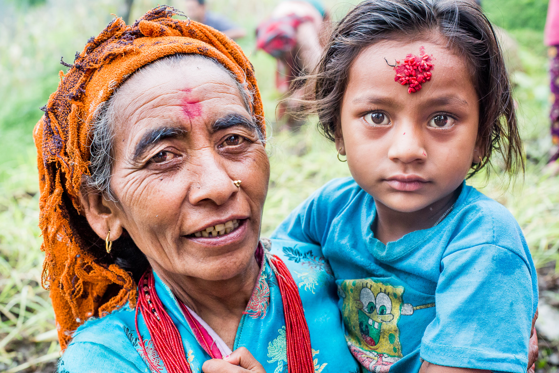 Mother and her daughter with a new shirt. 