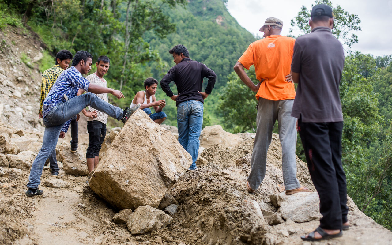 The idea of moving these big boulders by hand soon faded after we took a closer look. We had to wait for an excavator.