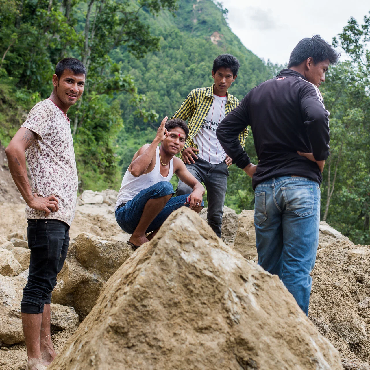 Posing on the landslide that blocked the road.