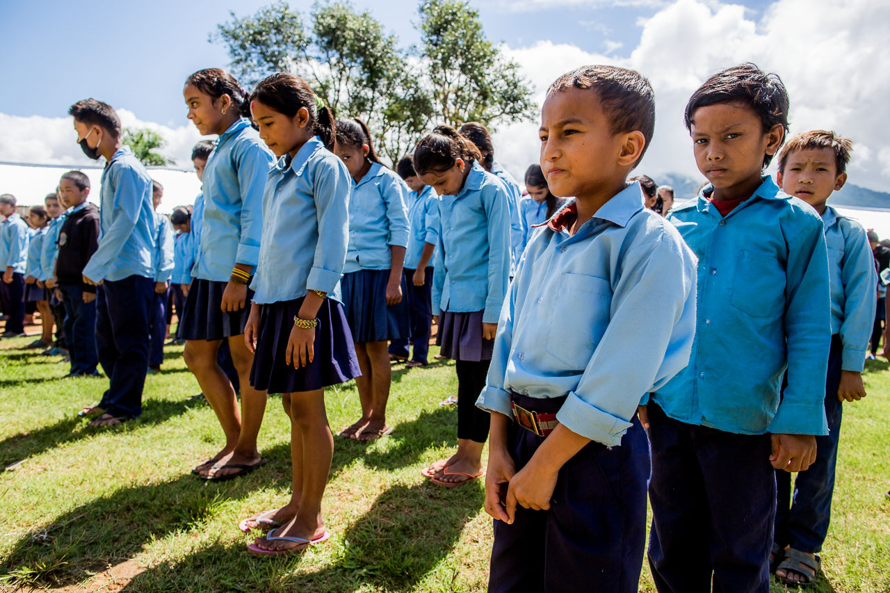 Lined up from youngest to oldest. The school day begins like this every morning, in every school across Nepal.