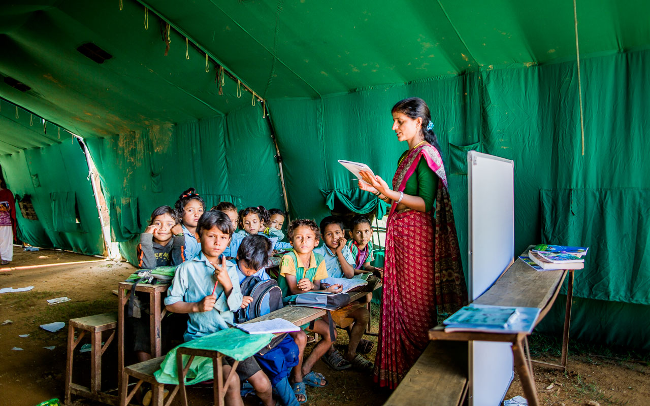 Third class with their teacher.