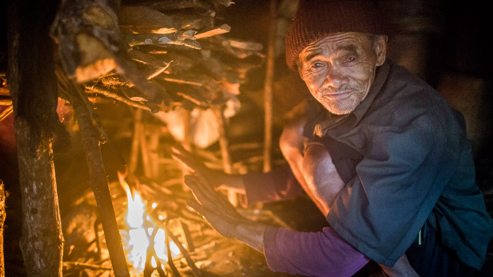  Because Laprak is at 2300 meter about sea level it can get cold in evening. They warm themselves at their fires. 