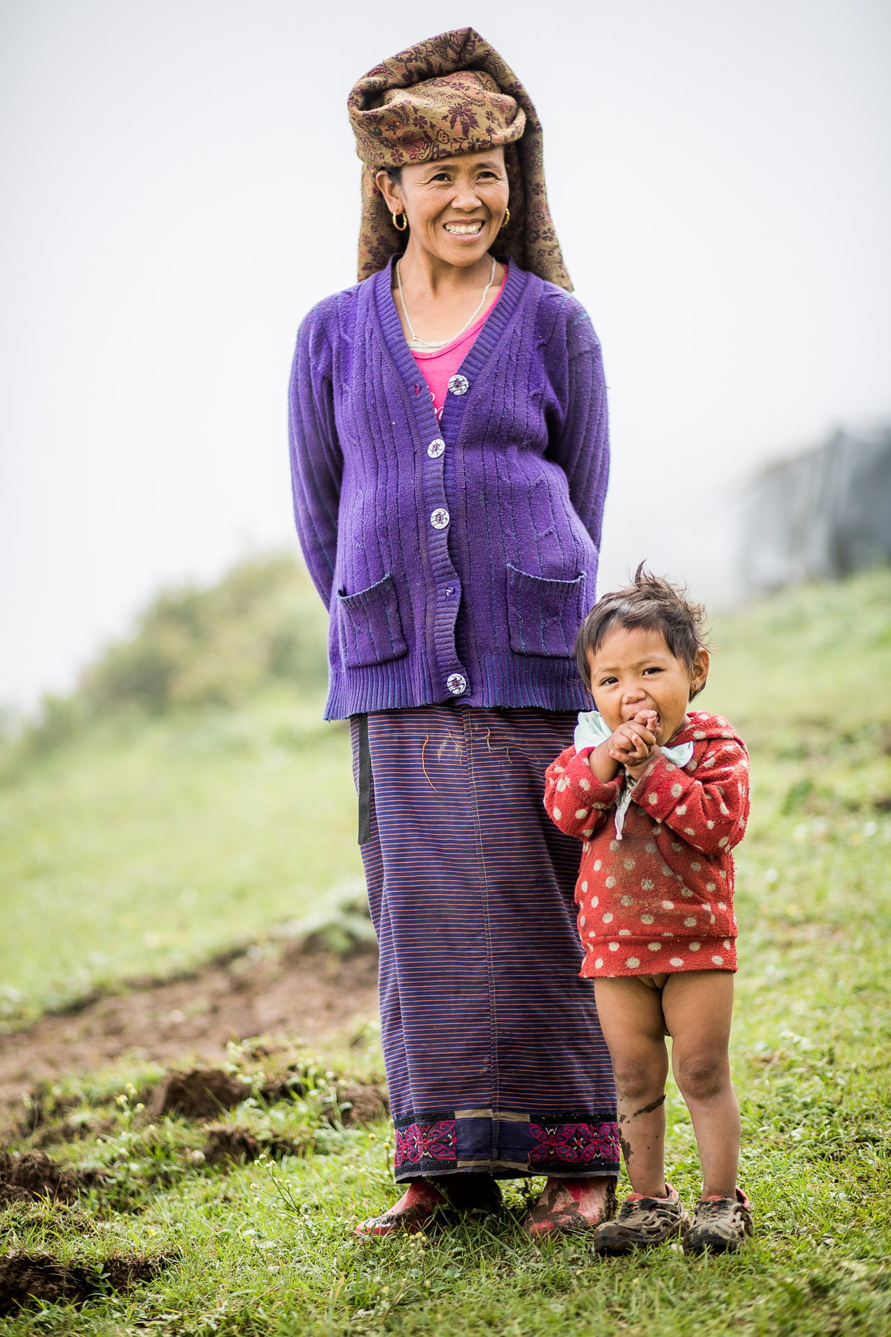  Mother with her daughter looking over the valley. 