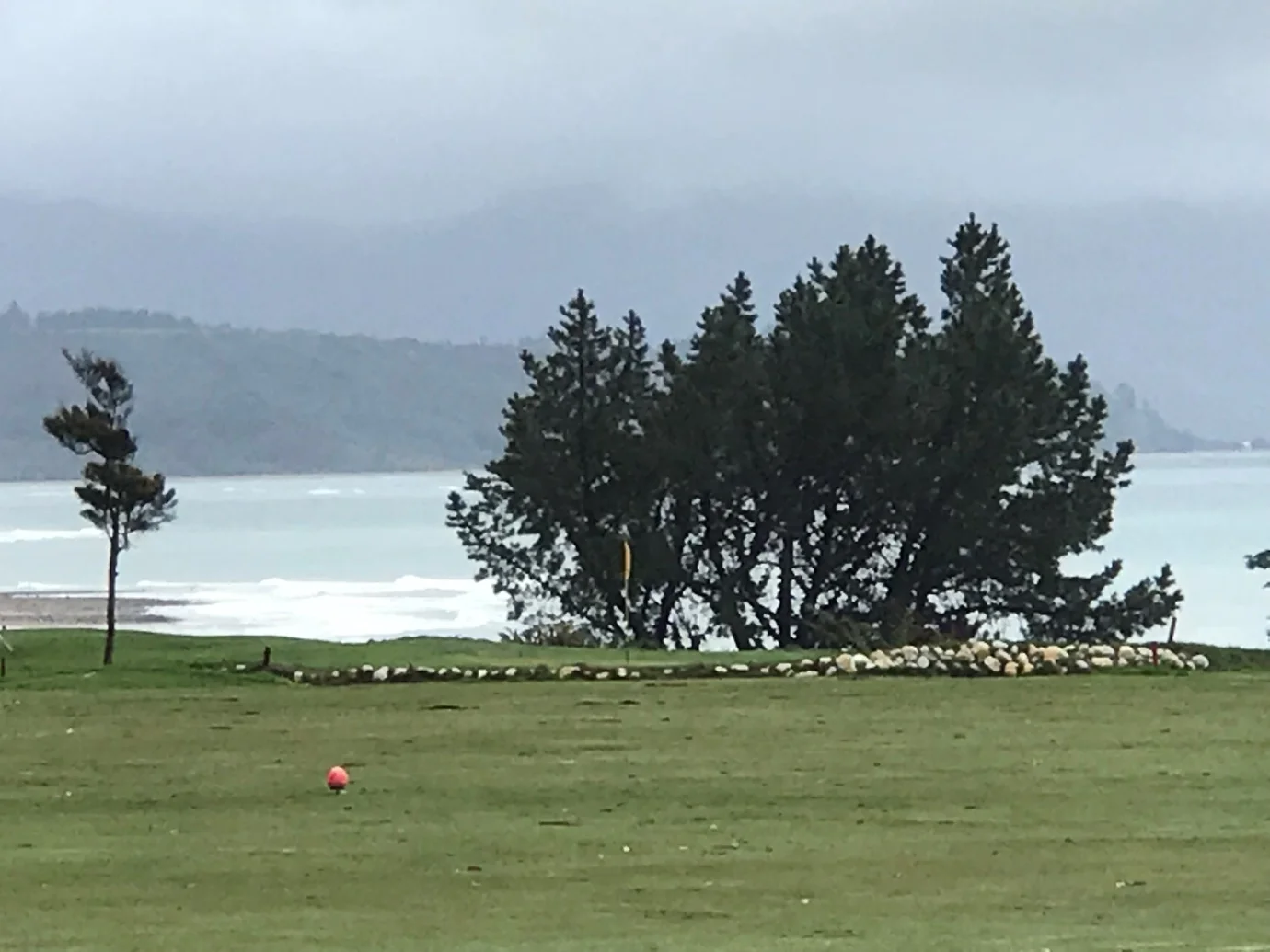 The longer option view from the tee. Penalty areas left, front and behind…