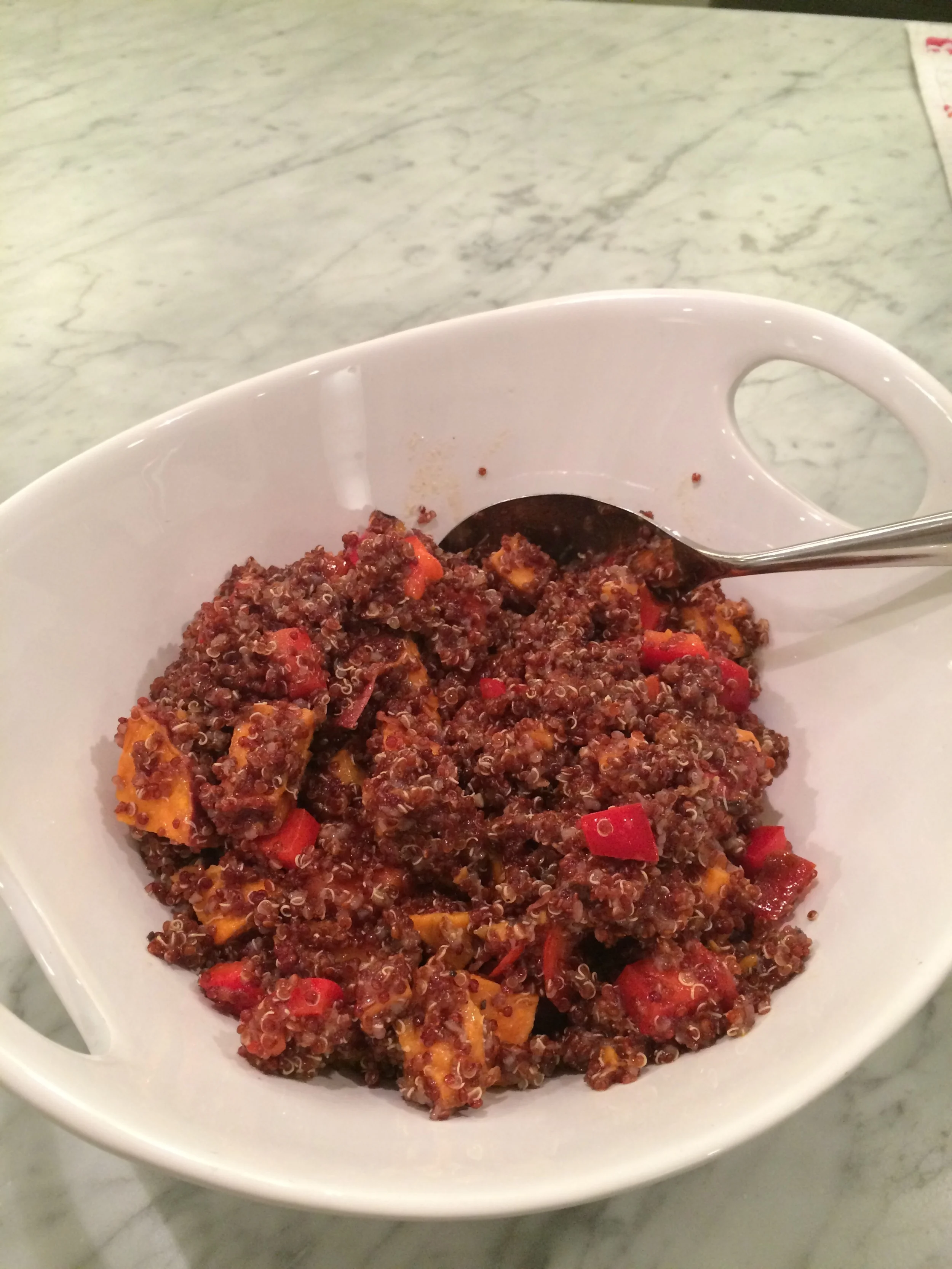 Great spicy sweet potato and quinoa recipe - perfect combination of carbs and protein. I substituted lime juice for lemon juice. Perfect.