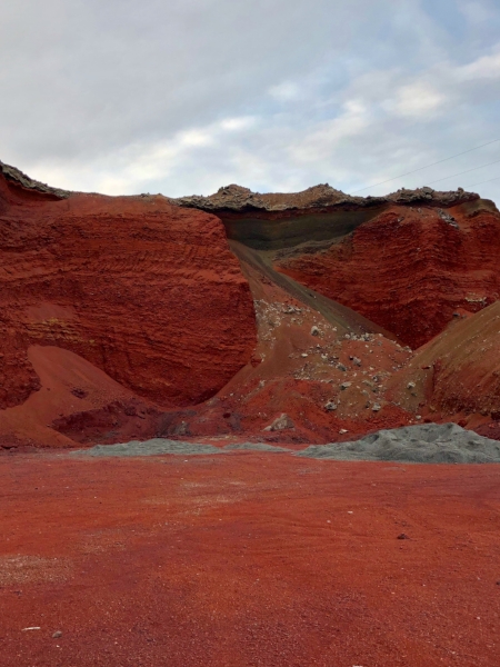  Red lava rock in Iceland. Yes it is really red. Lately it's being used to make roads. Red roads. 