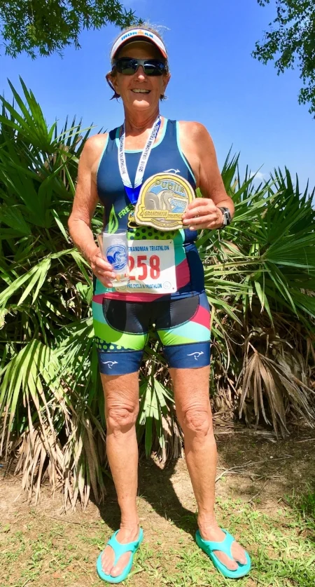 Gini came in first in her age group at the Grandman Triathlon on Saturday, June 2, in Fairhope, Alabama, her second race since Bill's death. The triathlon event comprised a 1/3-mile swim in Mobile Bay, an 18.6-mile bike, and a 3.1-mile run.