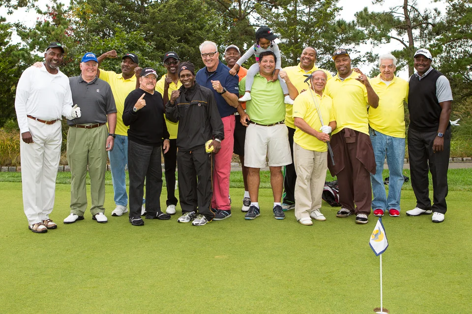 Left to Right: Eddie Cotton, Randy Neumann, Bruce Seldon, Steve Smoger, Mark Breland, Livingstone Bramble, Gerry Cooney, Junior Jones, Gus Williams, Paul Vegliante, Ms. Witherspoon, Tim Witherspoon, Randy Gordon, Ray Mercer, Ed Post, and Earl Brown. © 2014 Sonya Szosyak