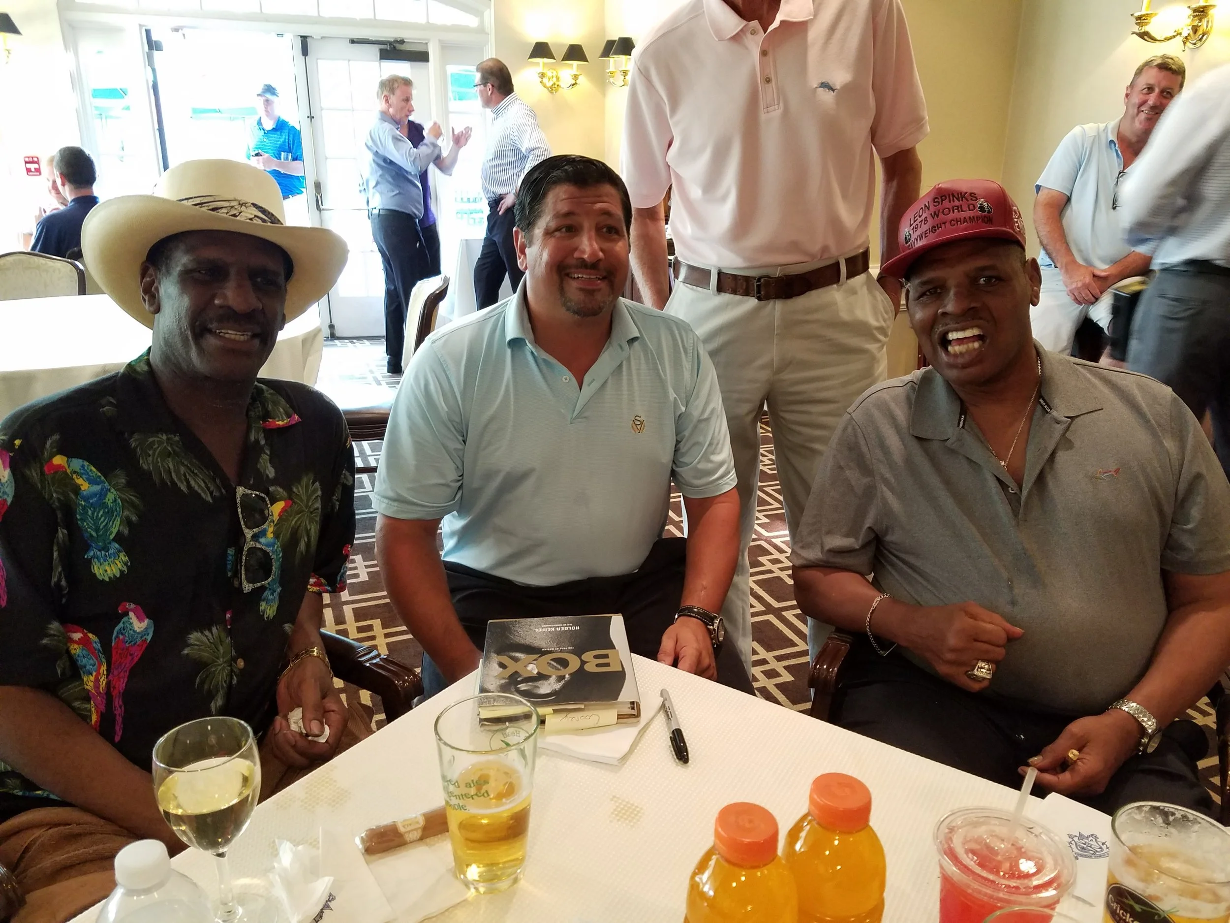 AAIB President Paul Vegliante with Michael and Leon Spinks.
