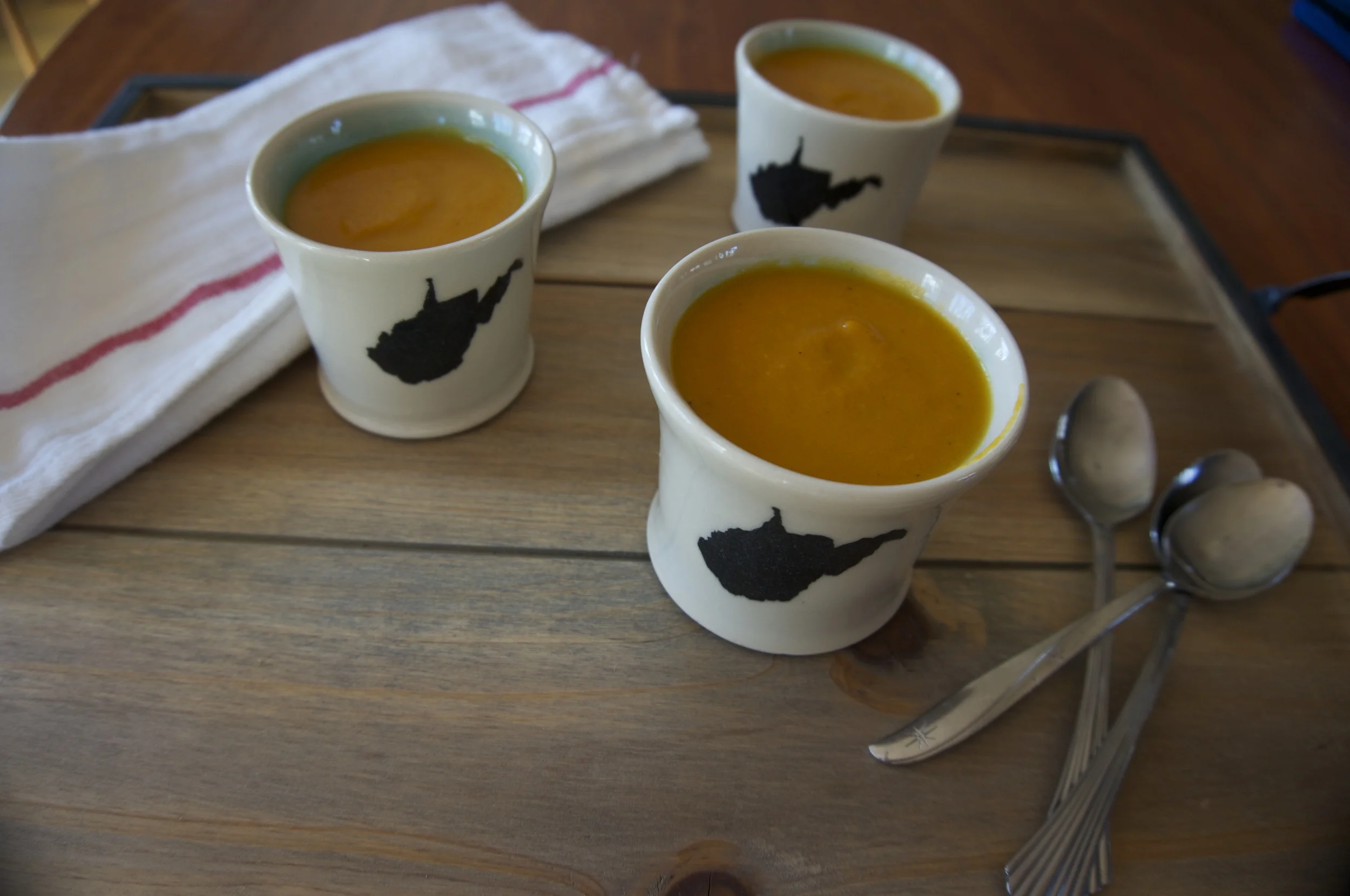 Handwarmer mugs, saluting West Virginia, from Wingard Pottery