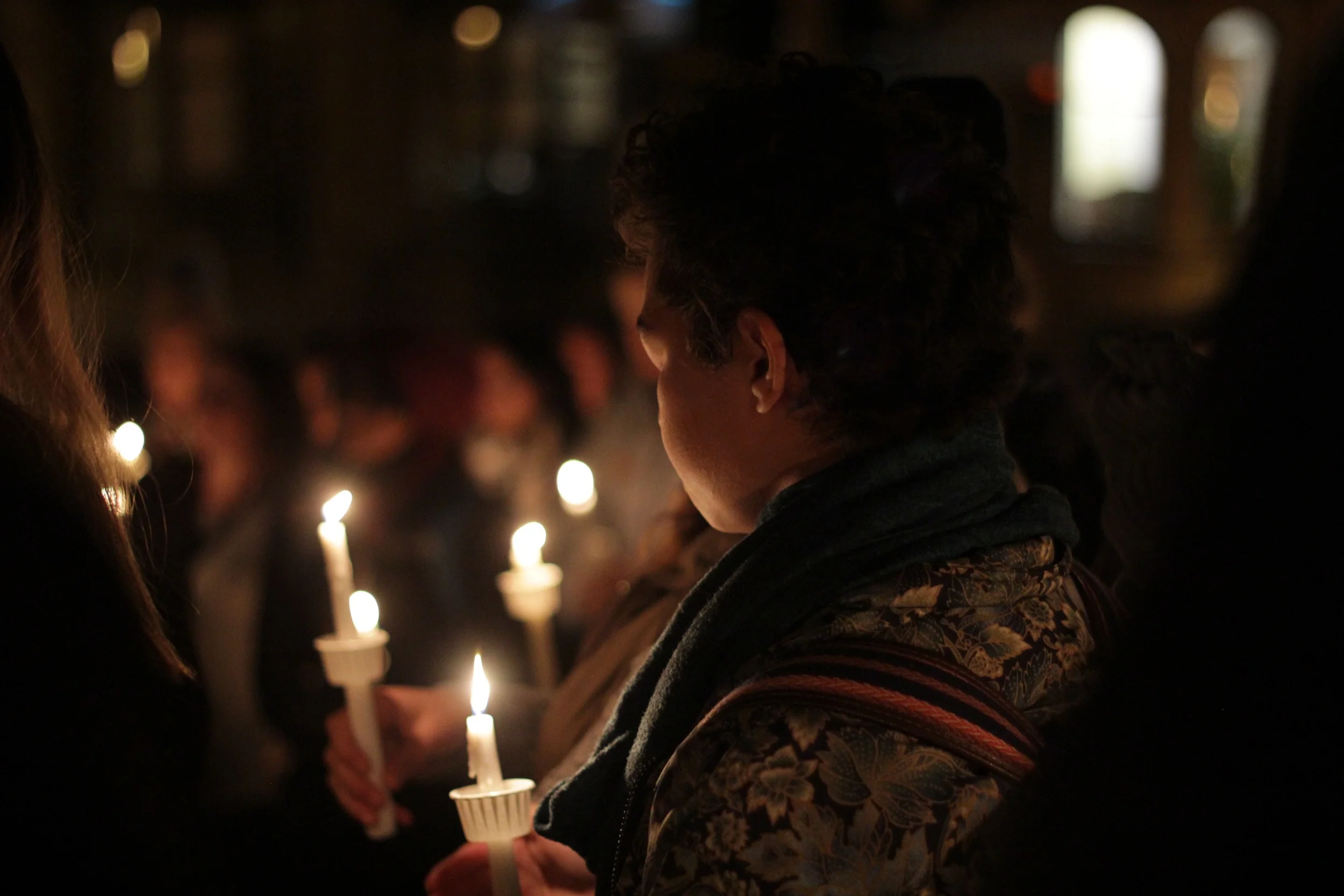 This photo was taken at a candlelight vigil responding to the string of terrorist attacks in Paris, Baghdad, Beirut, and several other countries. Photocredit: CJ Ormita
