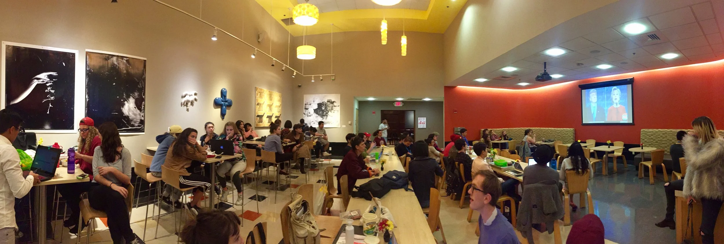 Politically-active RISD students watching one of the presidential debates in the Portfolio Cafe. Photocredit: Sophie Chien