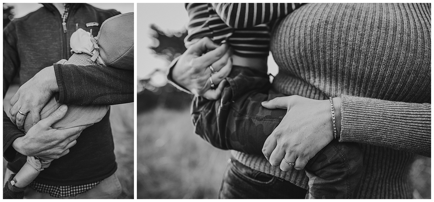 black and white images of dad and mom holding baby