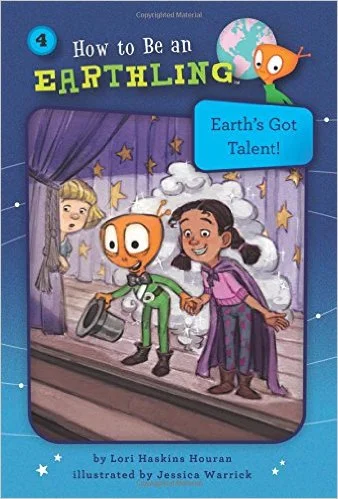 Book cover titled 'How to Be an Earthling' by Lori Haskins Houran, illustrated by Jessica Warrick, showing a girl and a robot holding hands inside a room with a starry night sky visible through the window.