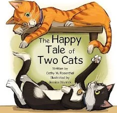 Cover of a book titled 'The Happy Tale of Two Cats' showing two cats, one orange and one black and white, lying on a shelf above the book.