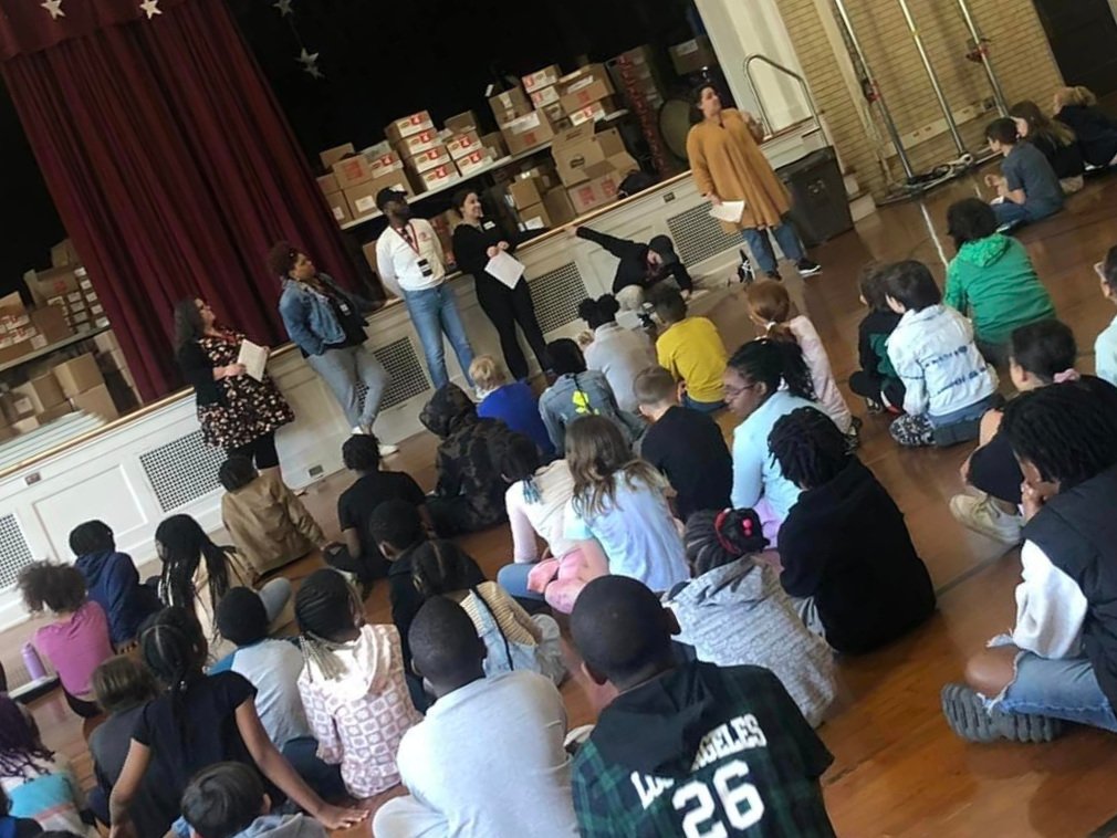 Dobama teaching artists present at an elementary school