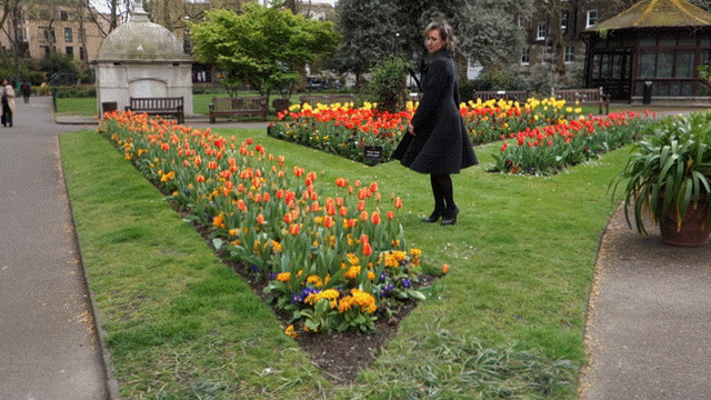 Tailored coat twirling.gif