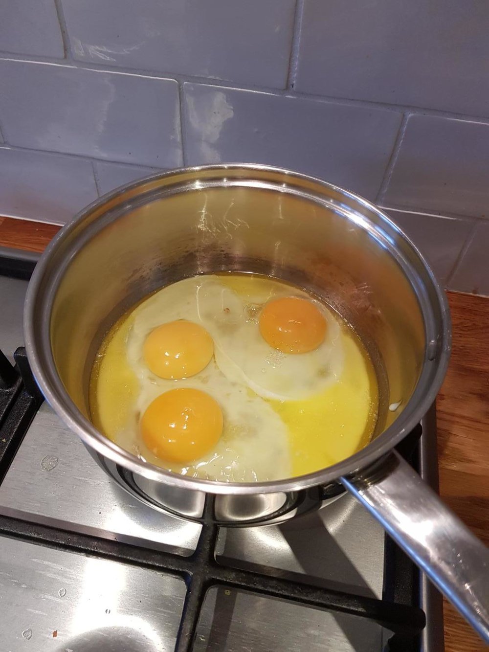  2: Start to cook the eggs in the butter. 