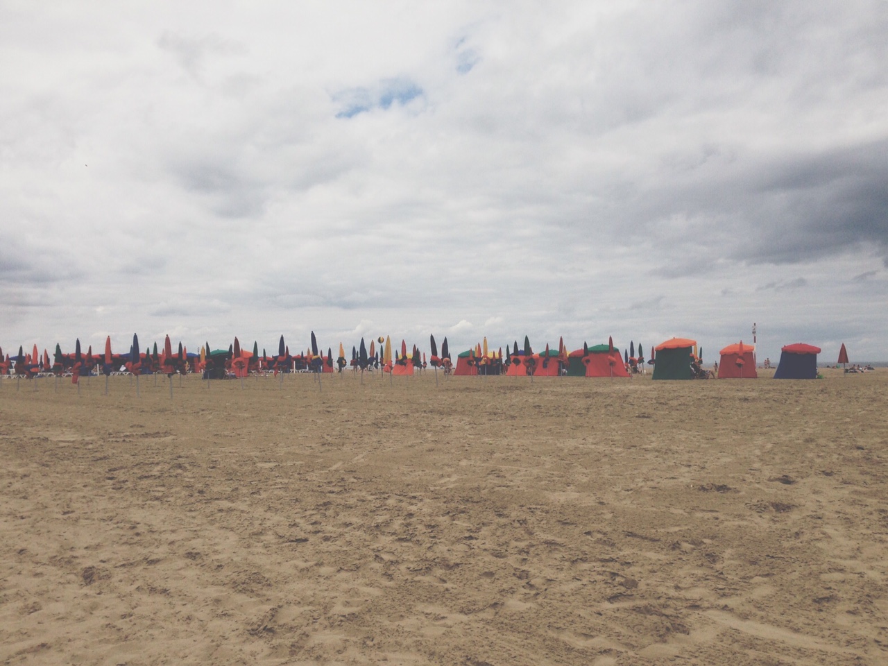 The seemingly endless flat stretch of sand that makes up the beach at Deauville
