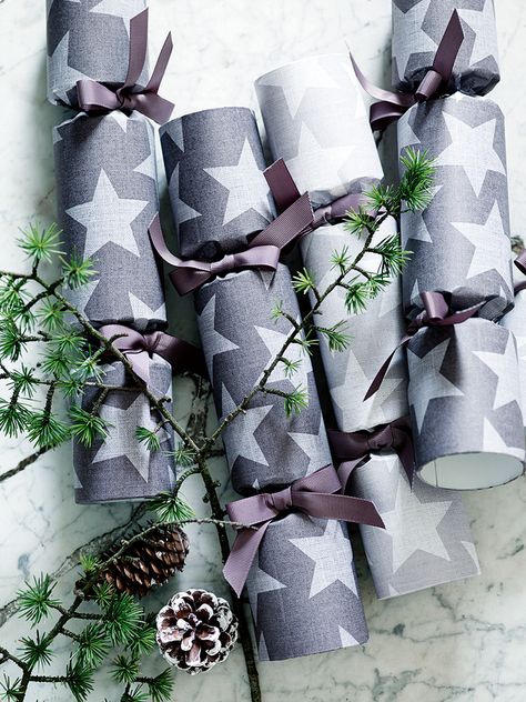 I also love these star crackers , although with mini graters, tea infusers and shot glasses hidden inside, I'm not sure they'll go down a complete storm with the boys...