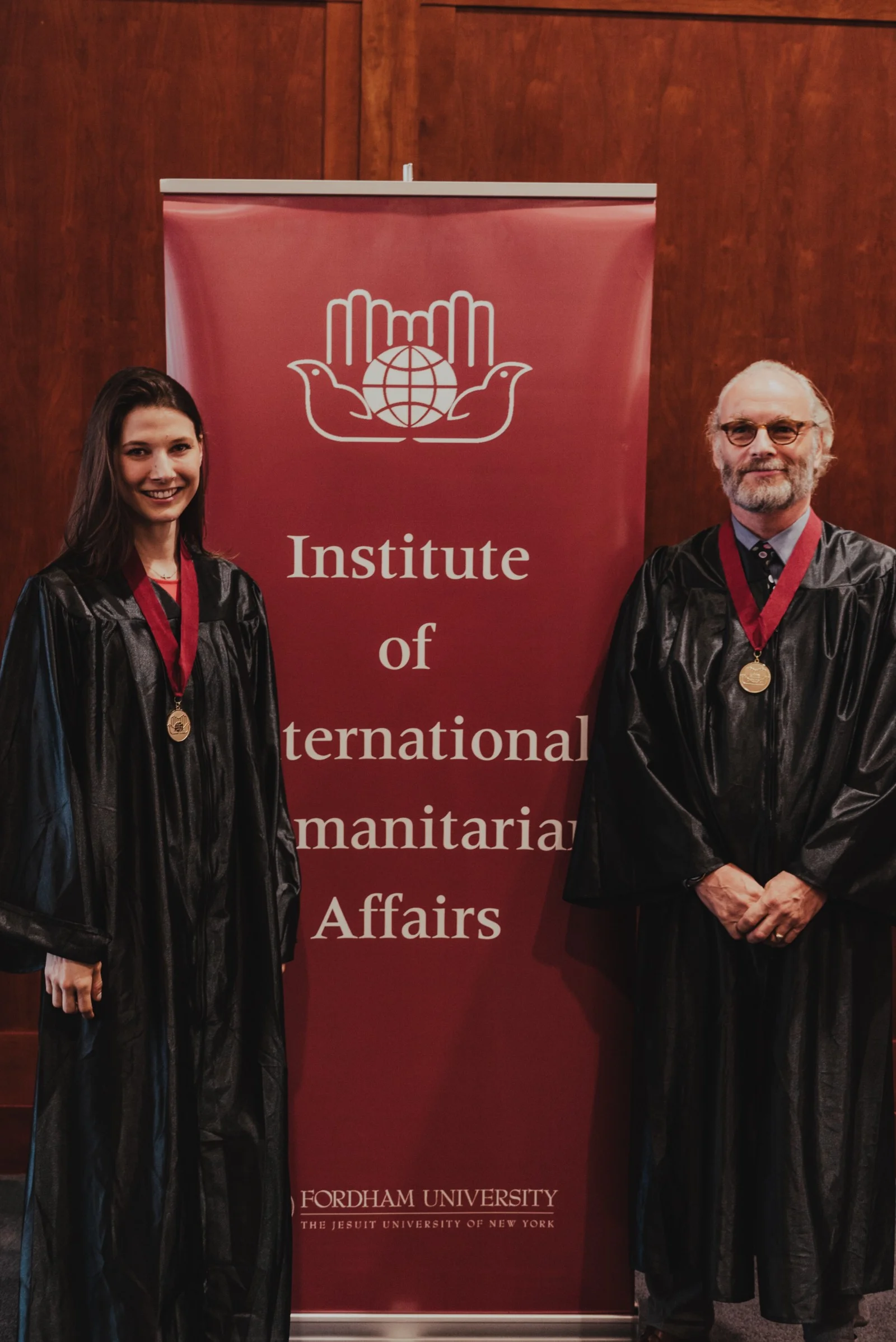 Peter Ophoff and Katarzyna Laskowski smiling after receiving their Master of Arts in International Humanitarian Action (MIHA).