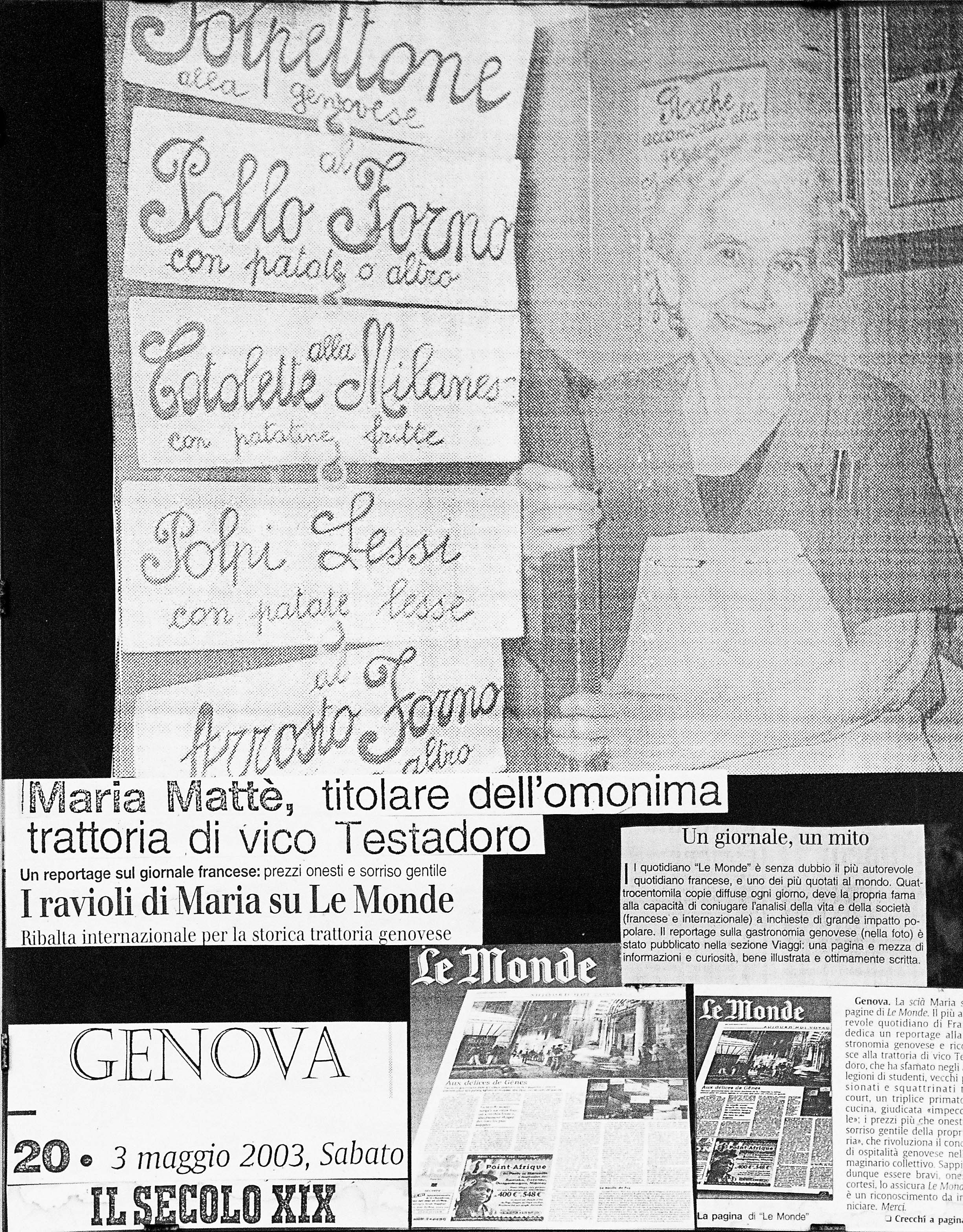 Some articles hanging on the wall appraising the food and hospitality of the infamous Maria.