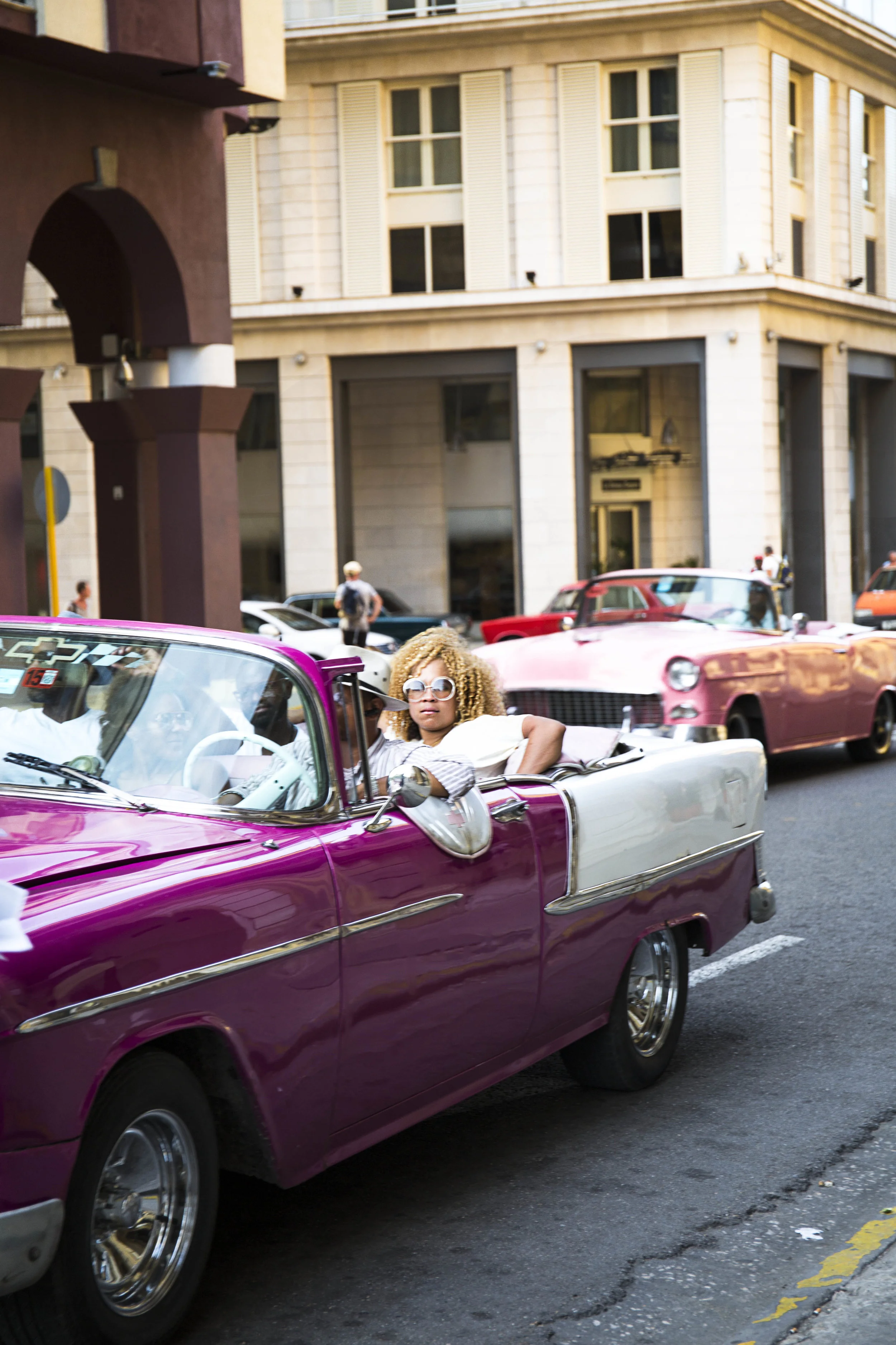Woman purple car sunglasses V.jpg