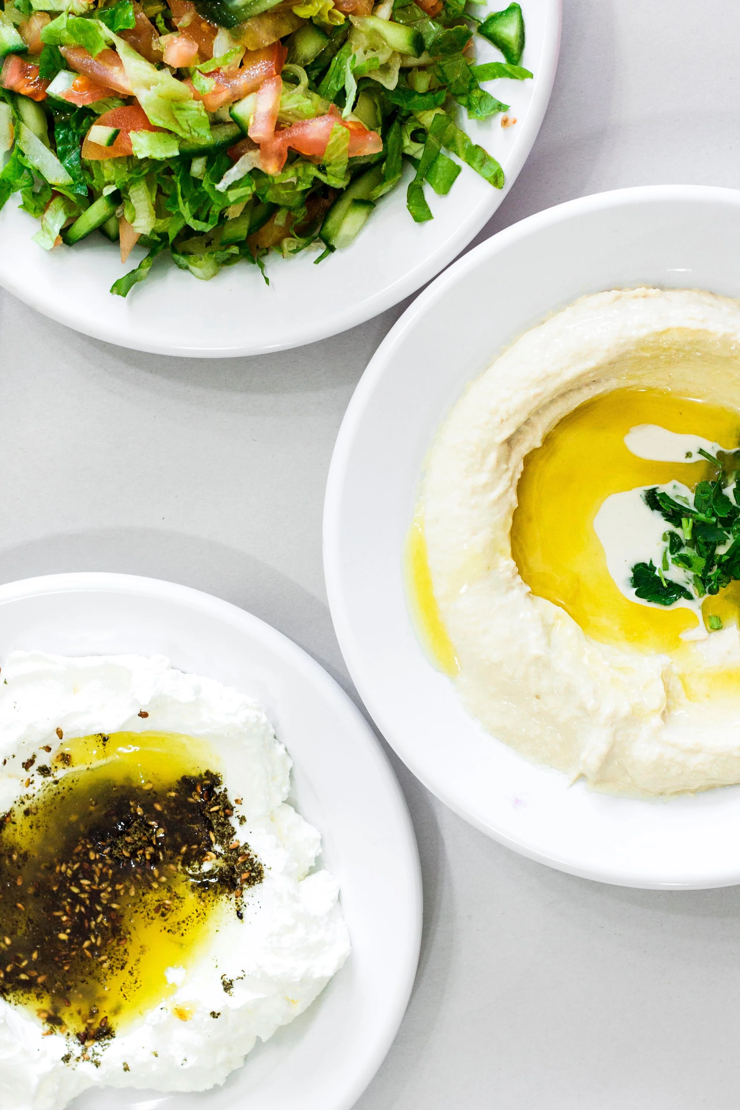 Hummus, salad, yogurt trio V.jpeg