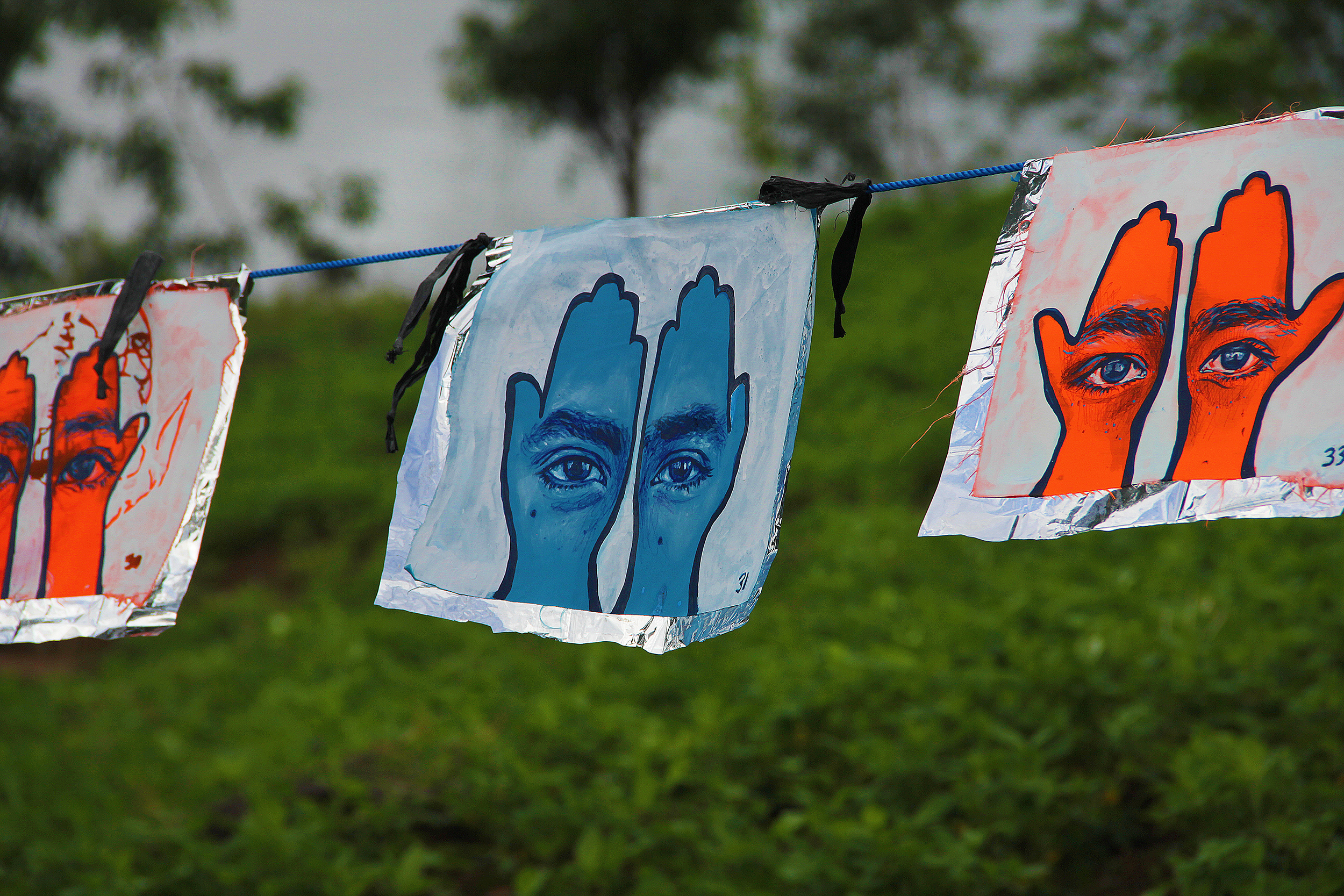 'Khamsa, Sadaqa Jaariyah (Endless Charity): The Refugee Crisis Portrait Project, Lombok Installation', 2016. Photo courtesy of artist.