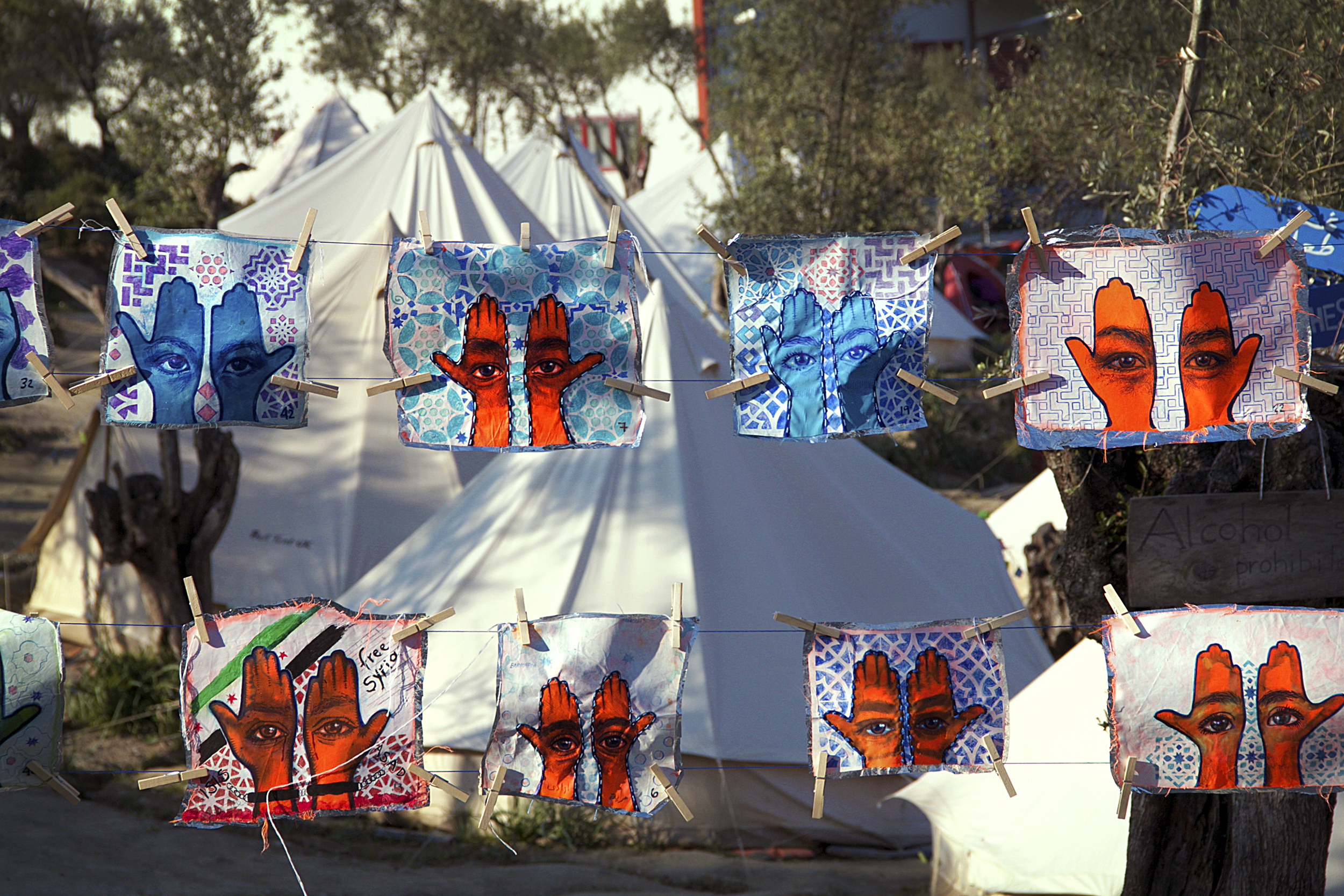 'Khamsa, Sadaqa Jaariyah (Endless Charity): The Refugee Crisis Portrait Project, Better Days for Moria Install'