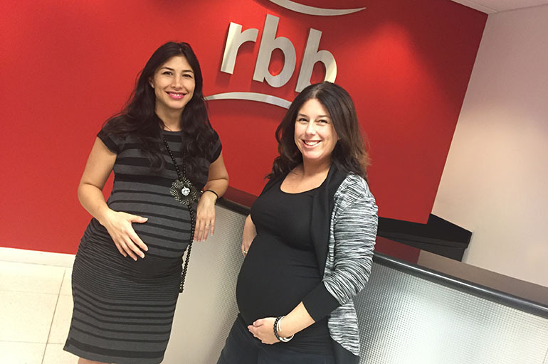 Mothers-to-be Zonnia Knight (left) and Susie Gilden, colleagues at rbb Communications in Coral Gables, Fla., say that Zika adds a new layer of anxiety to their pregnancies. (Courtesy rbb Communications )