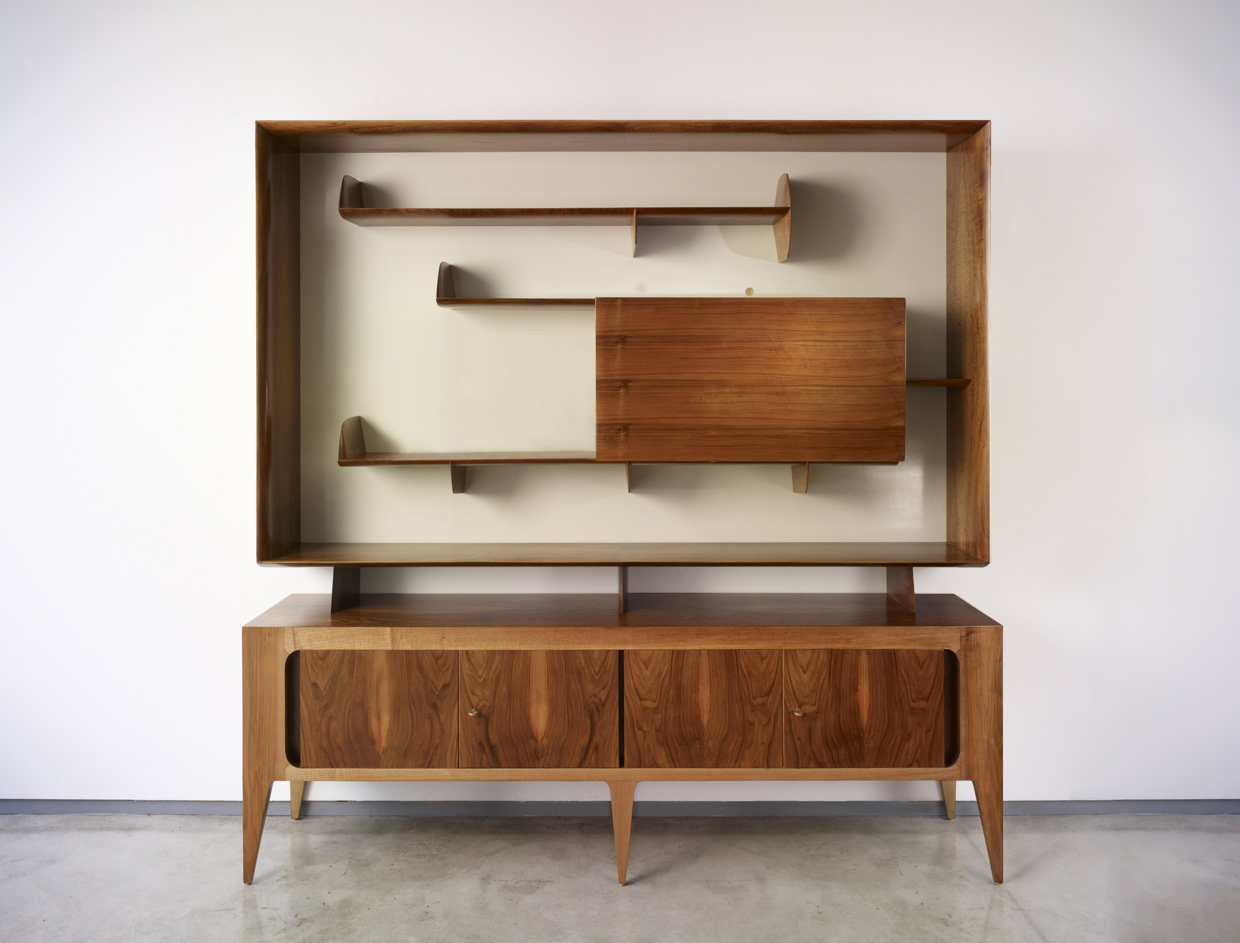 Giò Ponti (Italian, 1891–1979) Display cabinet, model 2140, 1951 Made by Singer & Sons Italian walnut, lacquered wood and brass 79 x 81 x 18 inches Museum of Fine Arts, Houston. Museum purchase funded by the John R. Eckel Jr. Foundation, 2016.145.A-B