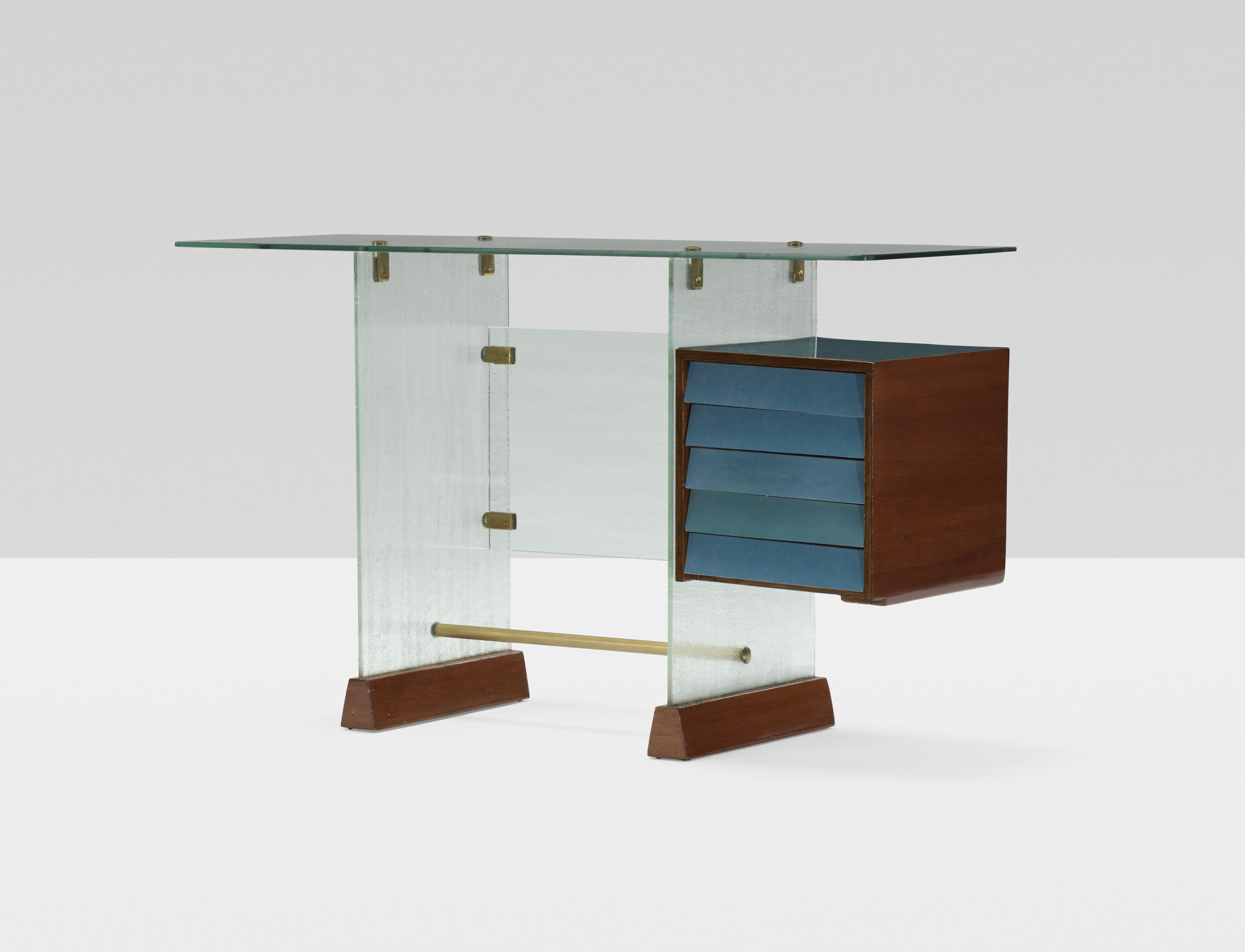 Giò Ponti (Italian, 1891–1979) Desk from the Societa Vetrocoke Building, Milan, ca. 1939 Vitrex glass, laminate, Italian walnut, enameled steel and brass