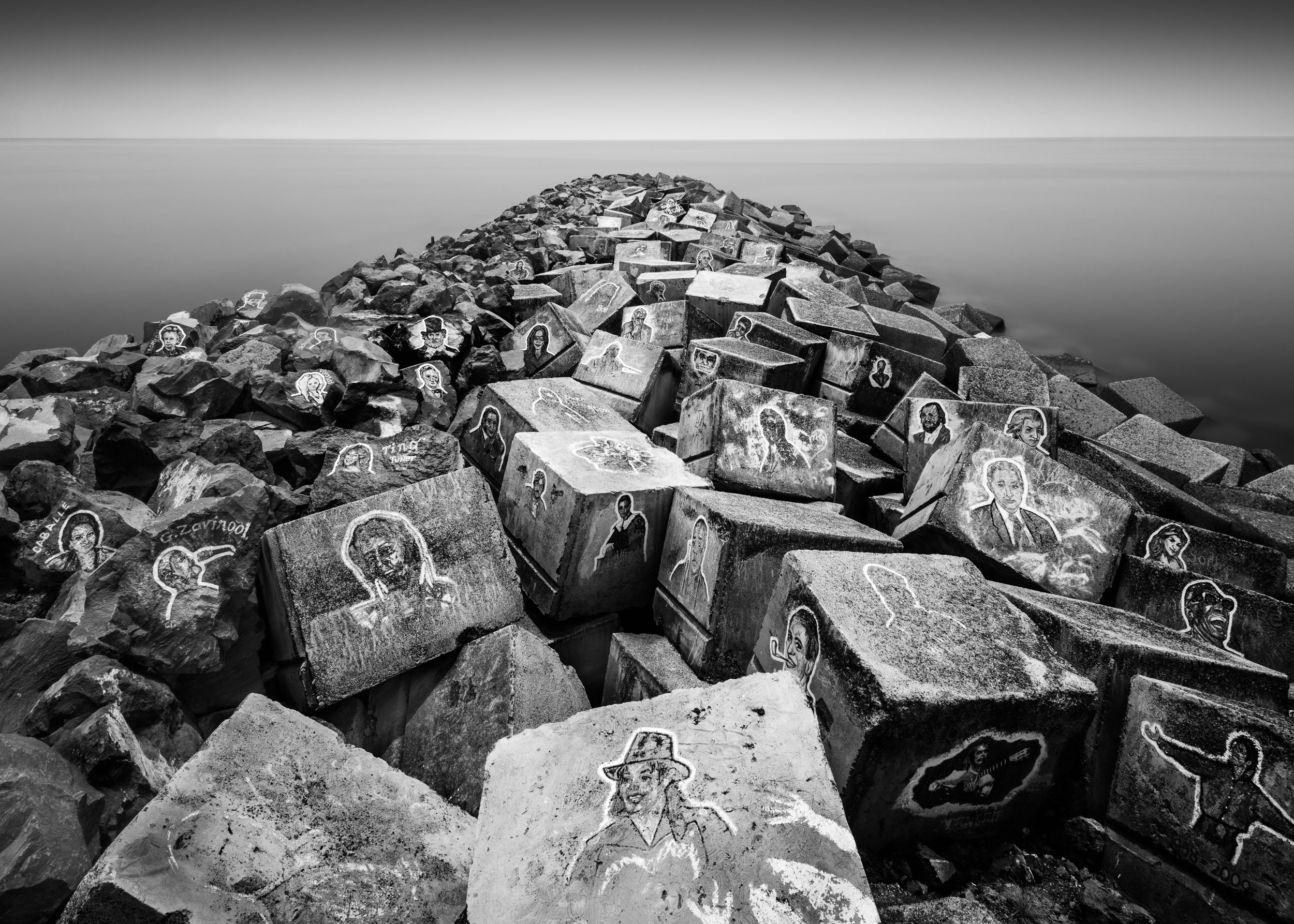 Musician Faces on Rocks