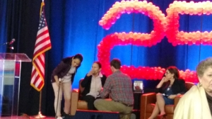 Yael Dayan being mic'd up before the start of her presentation