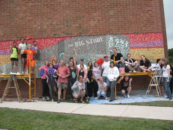 Group creating a mural