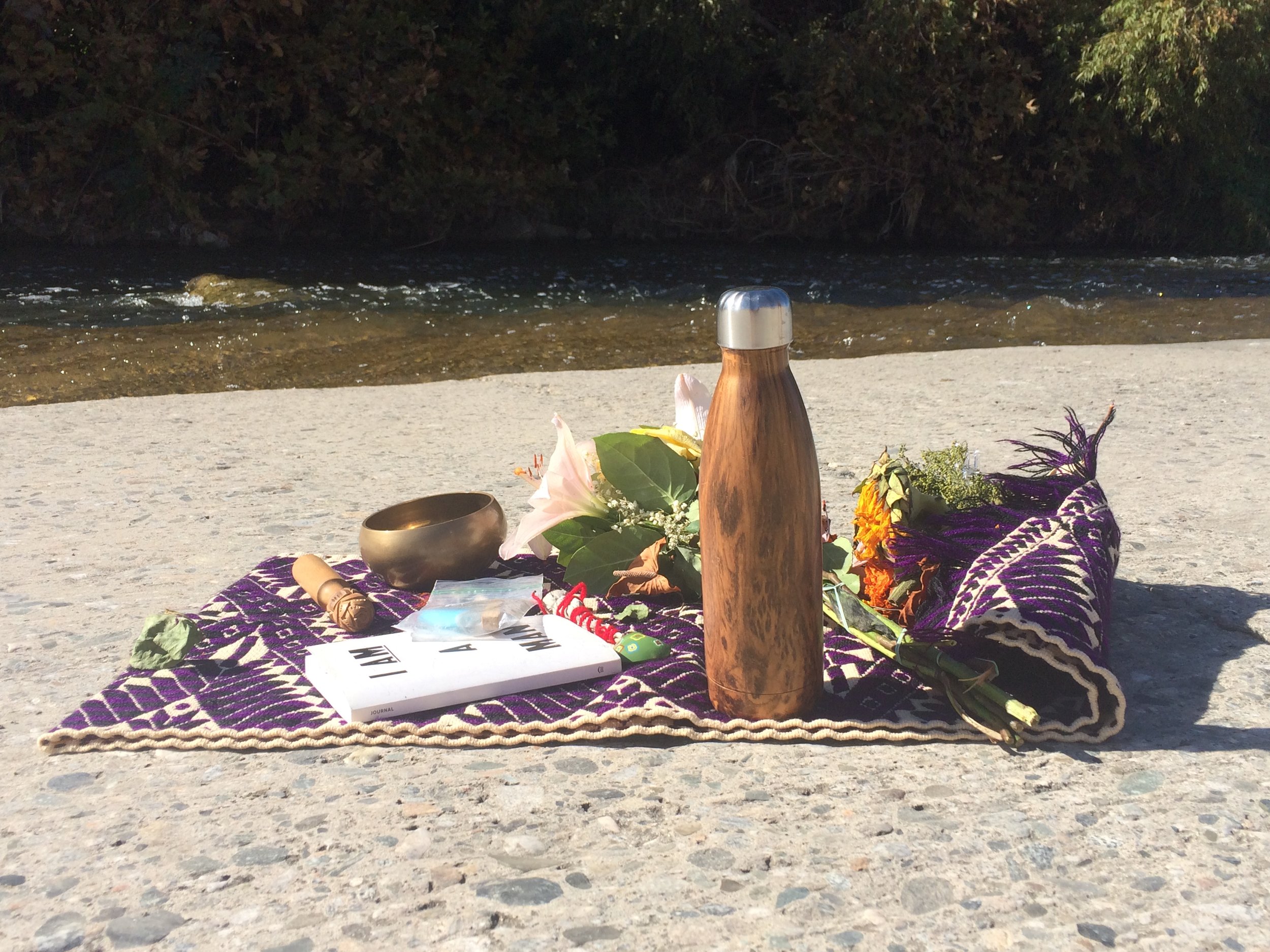   Our centerpiece with offerings of flowers to the river.  