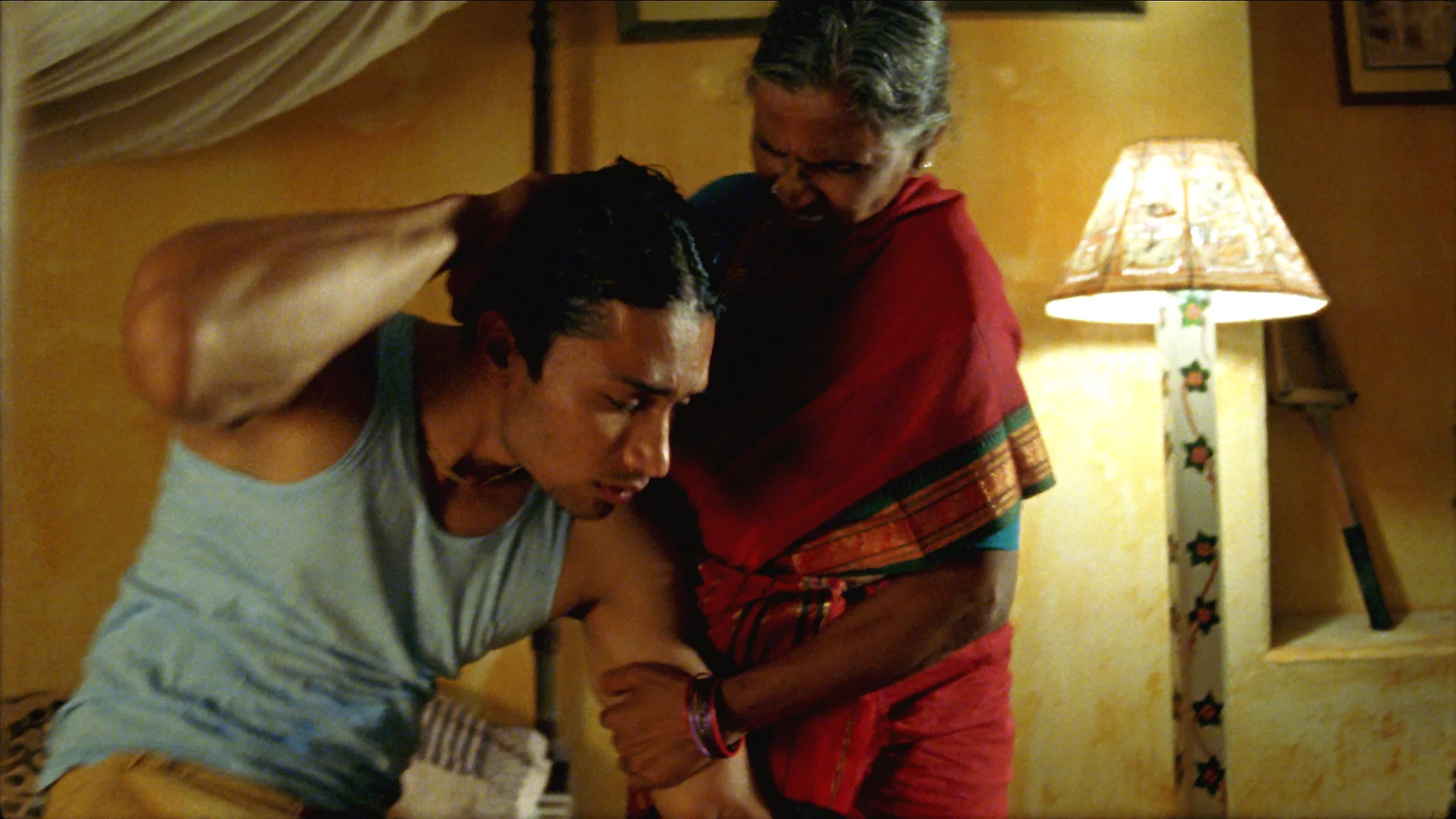 Rama Devi grabs Shekhar.jpg
