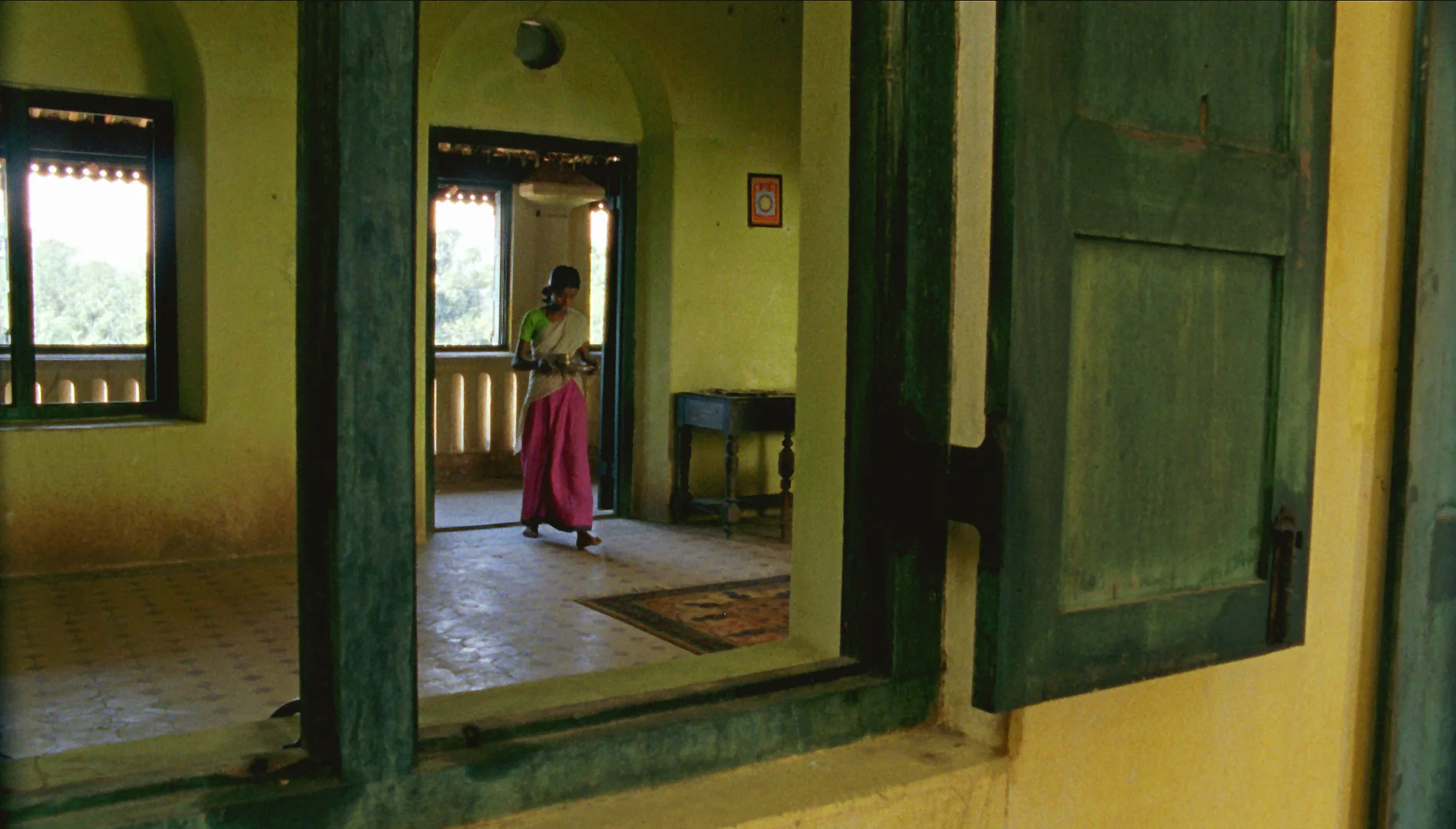 Vanaja walks in with biscuits.jpg