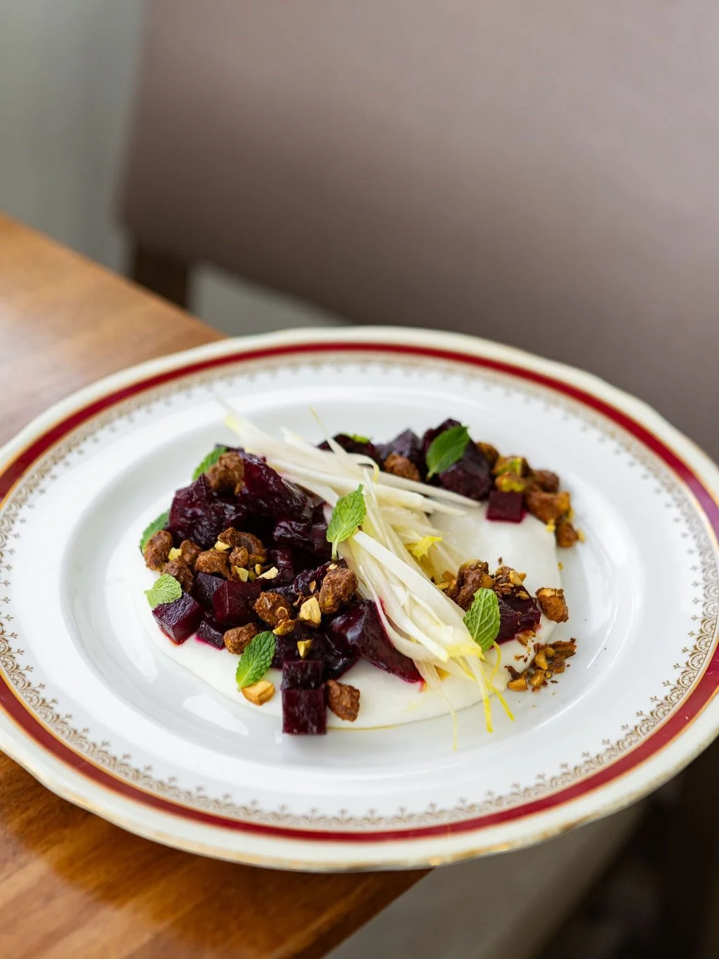 A celebration of the farms that shape our table. Our @poplarblufforganics Beets land with @fairwinds.farm whipped goat feta, endive, spiced pistachio, and bright pomegranate. On our lunch and dinner menu. Delicious! 
#beetsalad #yyceats #yycgrowers #