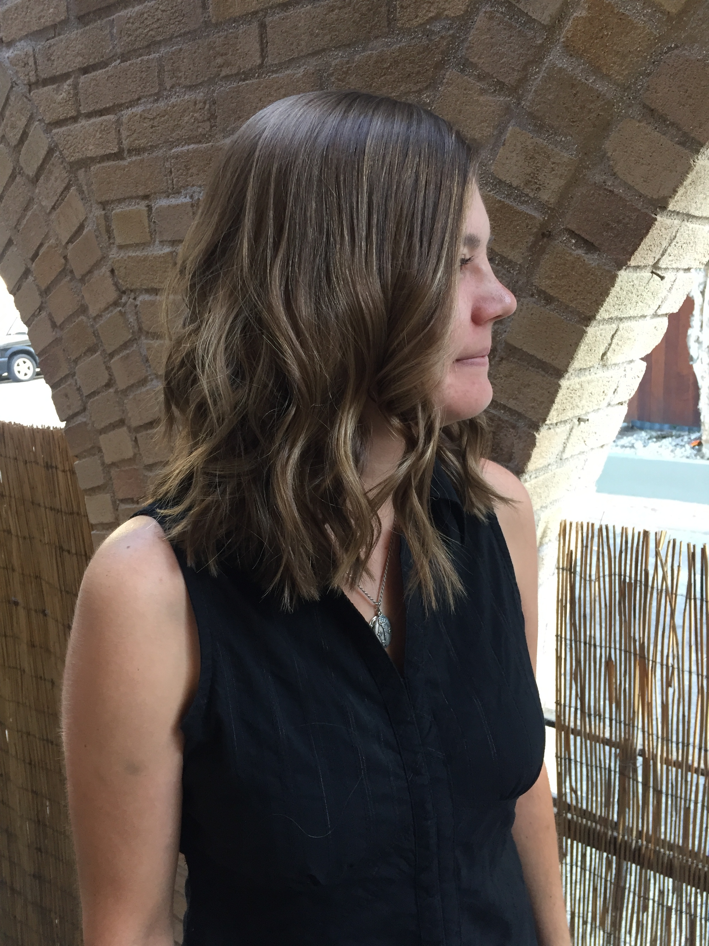  Natural babylights throughout entire head to achieve a sunkissed look. Fresh trim to create fullness with movement throughout. Low maintenance for someone who prefers to go several month between services.   