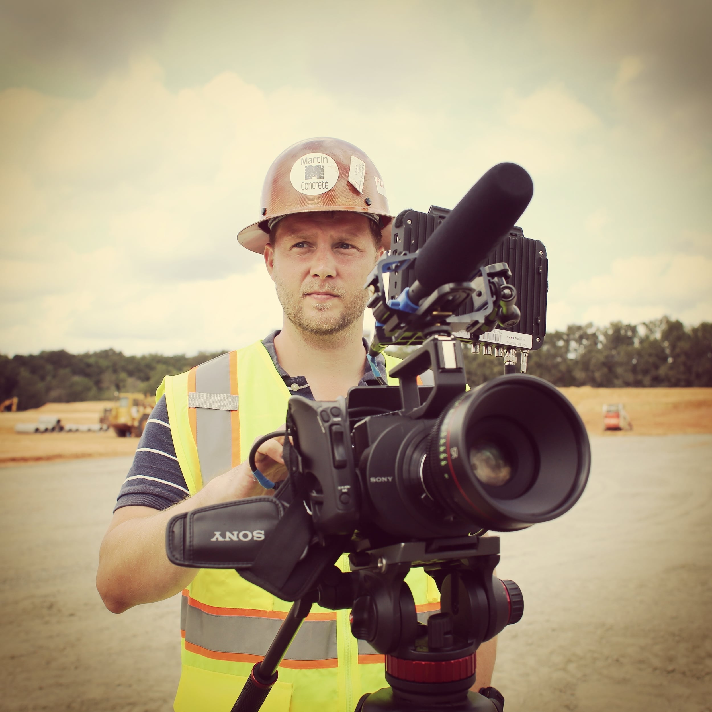 Charles Georgi behind a Sony FS700 camera, Canon CinePrime 50MM lens, and Oddysey 7Q