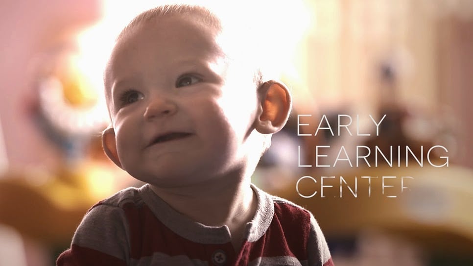 Adorable screenshot of a baby boy in the Excel Video.