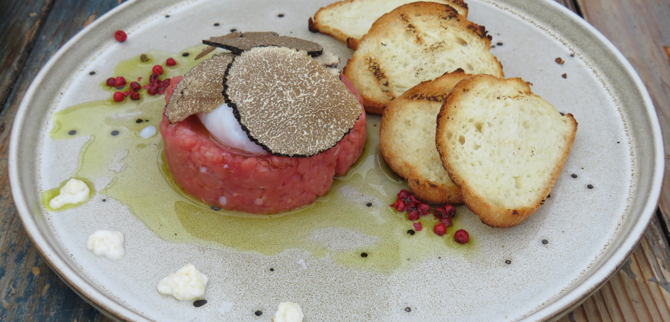 croatia tartar with poached egg and truffle.png