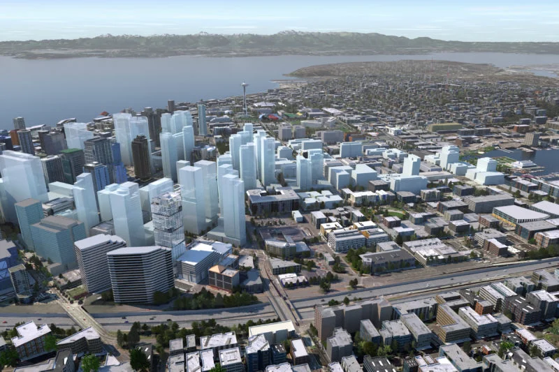 Above: An artist's rendering shows NEXUS (the silver tower in the lower left) at its future location at 1200 Howell St. The white buildings represent other projects planned throughout downtown. 