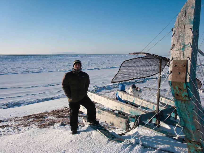 Paul Lawrence of SRB&A conducting fieldwork in Wales, Alaska, the westernmost point in North America. Photo Credit - Liz Sears.