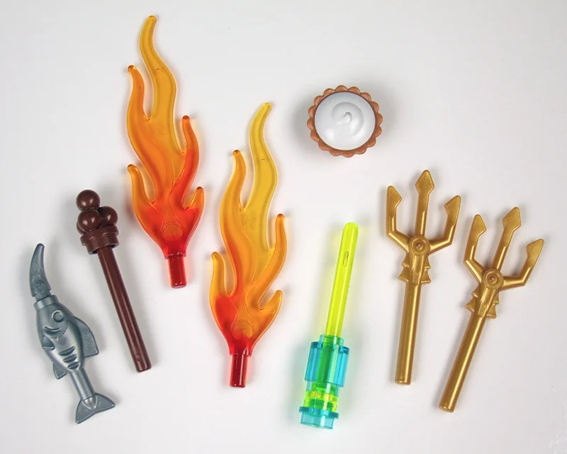 The Fish Dagger , the Staff of Chocolate Ice , a pair of Fire Brand s, the Magic Wand , ...an unnamed pie, some unnamed tridents, and various other accessories we never named or created rules for, not pictured here...