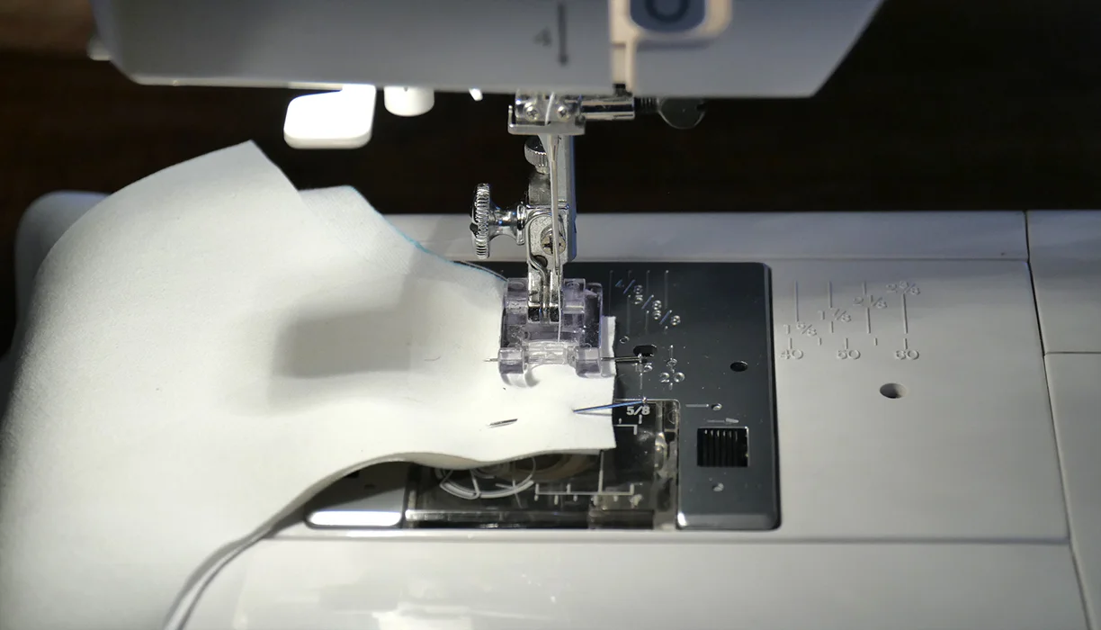 Sew a simple straight seam at each shoulder, following the edge of the fabric.