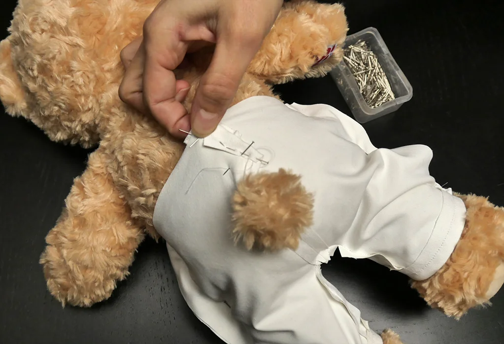 Decide how much overlap you'll need at this critical closure point in the back of your pants.
