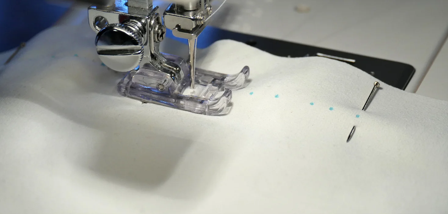 Remember to follow your marks when you run this seam on your machine. Sew in a straight line.